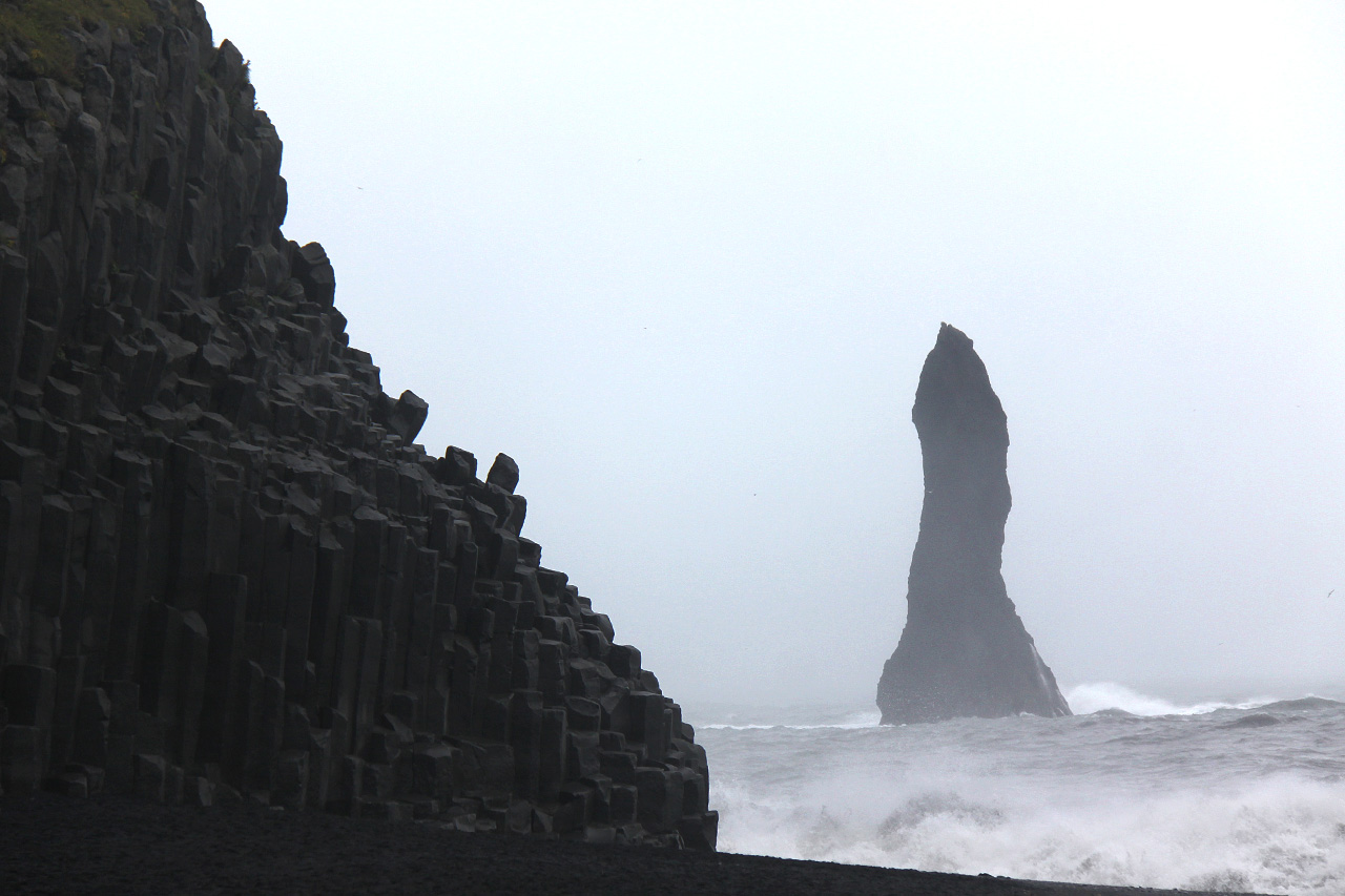 Reynisdrangar basalt columns and sea stack at Reynisfjara beach