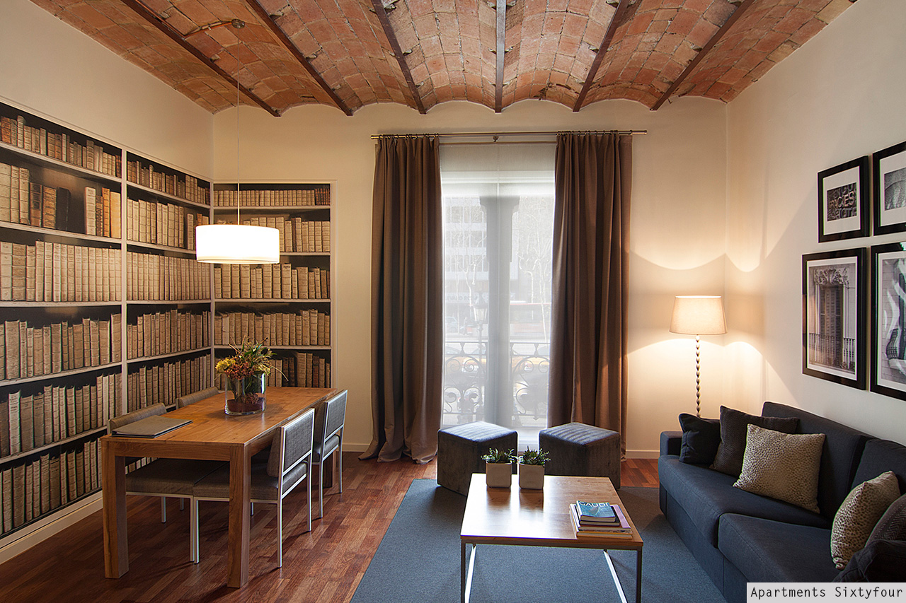 Apartments Sixtyfour living room with Catalan vaulted ceiling and library wall