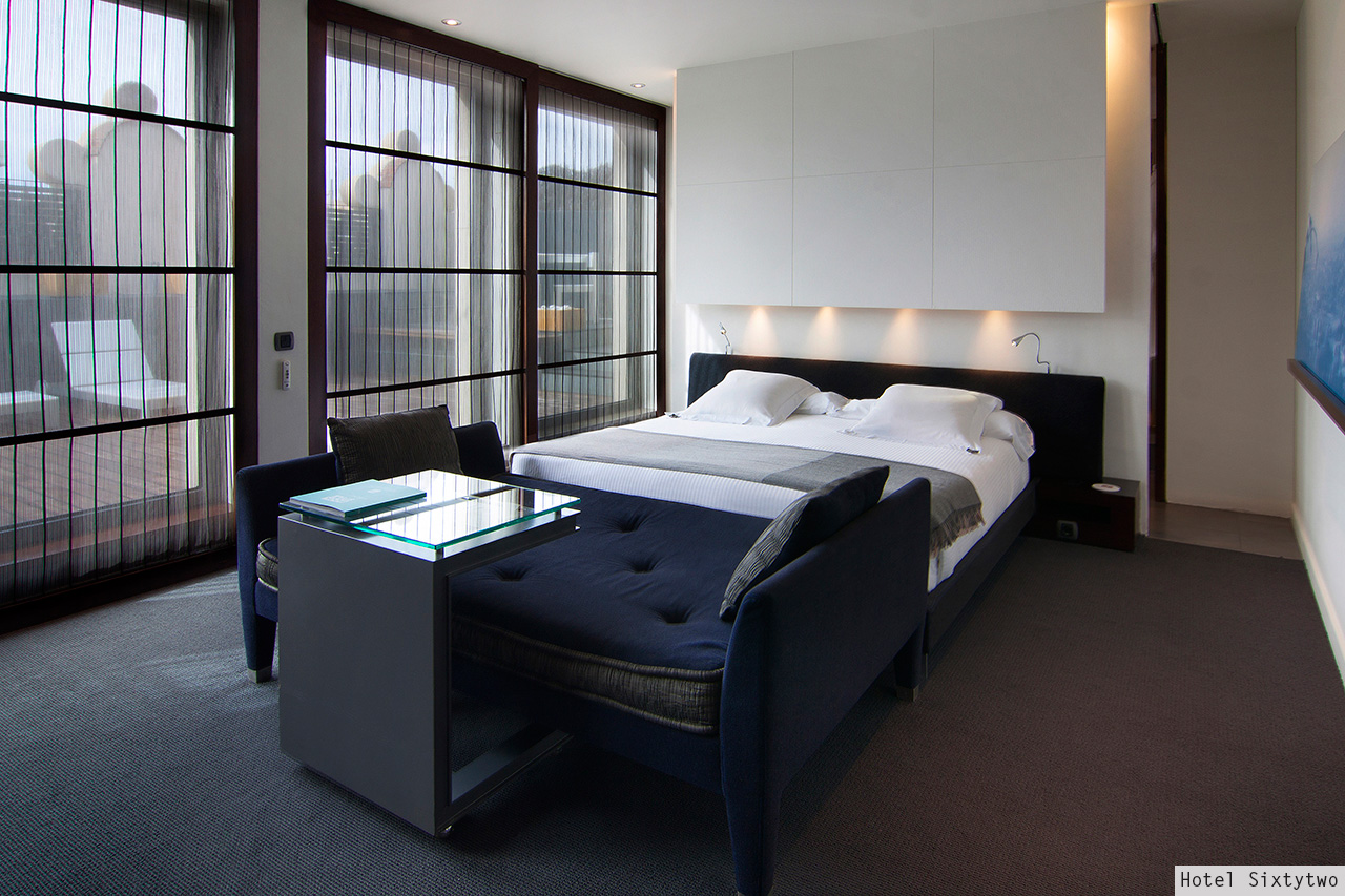 Hotel Sixtytwo modern bedroom with floor-to-ceiling windows