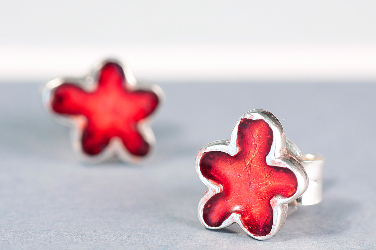 Silver flower earrings with red enamel