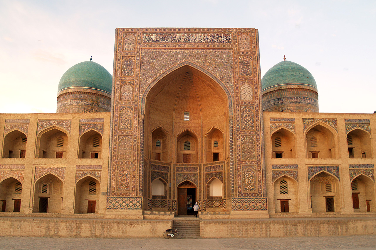 Mir-i-Arab Madrasah facade with turquoise domes, Bukhara
